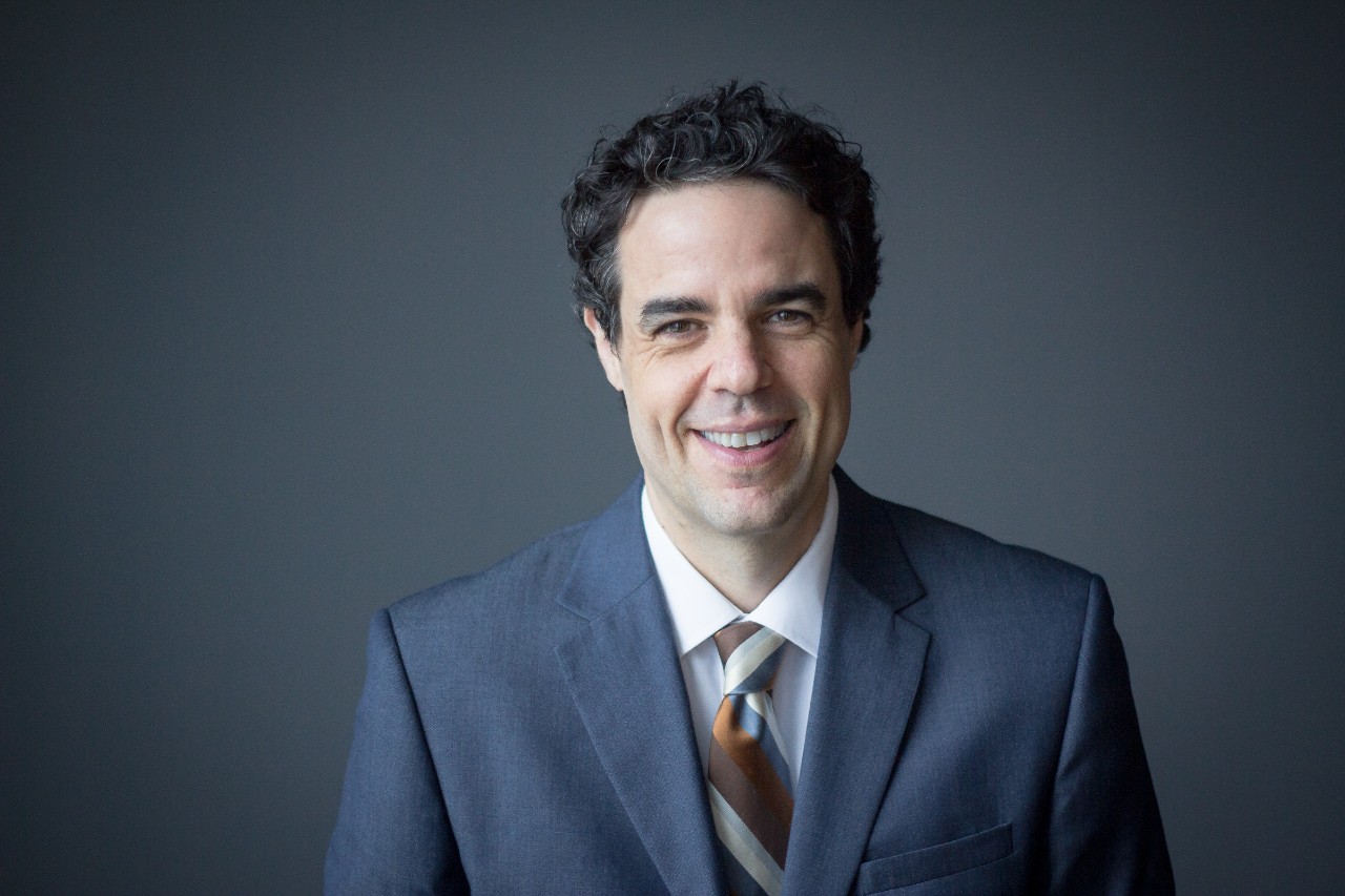 man in suit smiling