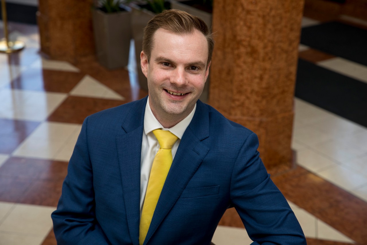 man in suit smiling