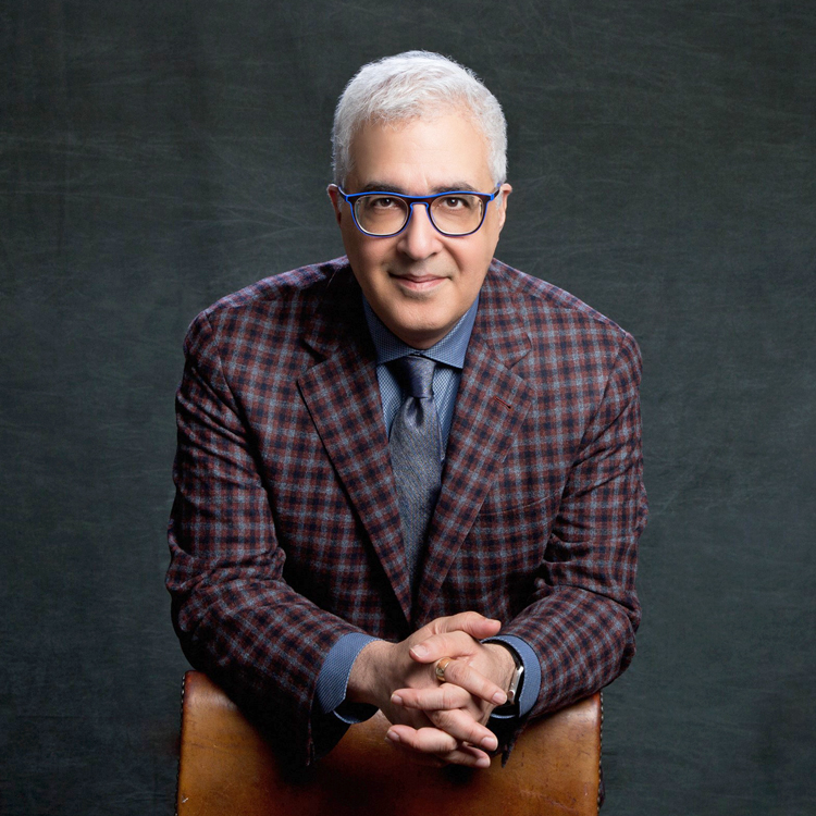 man in suit with glasses